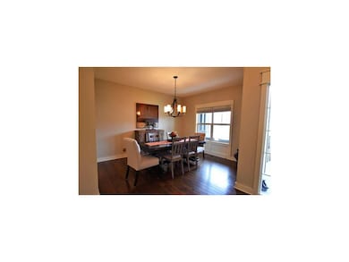 Formal dining room w/ beautiful wood floors