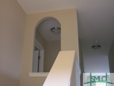 View of top of staircase from landing