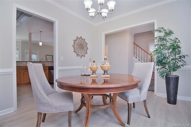Open to the foyer and kitchen for ease of entertai