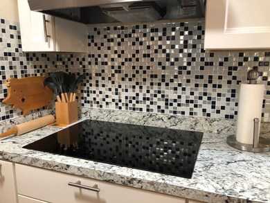 induction stove, tile back splash