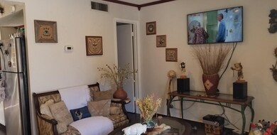 Living Room connects to bathroom that walks throug