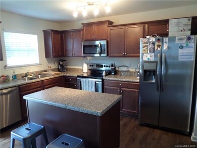 Lots of natural lighting in the kitchen.  All stai