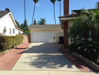 Long private concrete driveway is perfect for park