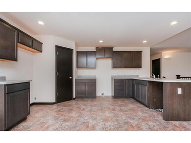 Kitchen view.  Appliances (Stove, Refrigerator, Di