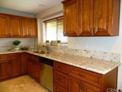 New wood cabinetry and blinds.