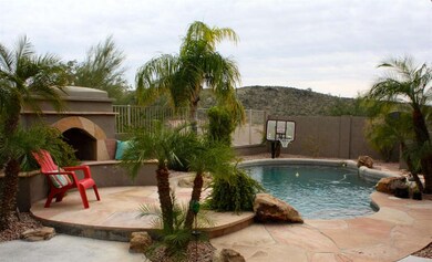 Backyard pool and patio area.