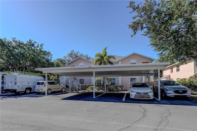 Covered parking lot featuring stairway