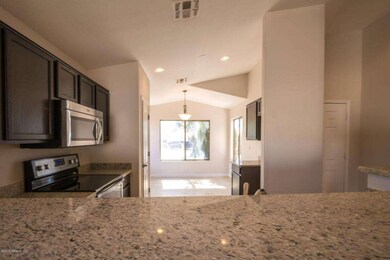 From Breakfast Bar Into Kitchen