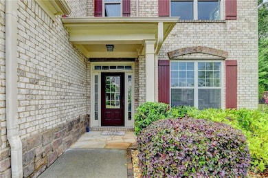 Entrance to property with brick siding