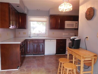 cherry cabinets , new flooring, and newer applianc