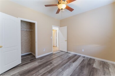 Unfurnished bedroom featuring baseboards, a ceilin