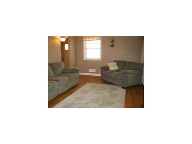 Living Room. Hardwood floors and newer paint in li