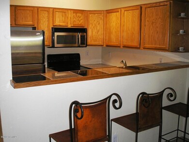 Breakfast Bar with Granite tile counters