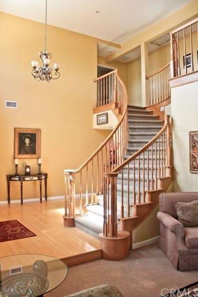 Dramatic spiral staircase at the entry