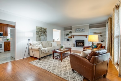 At the entrance, you are greeted by warm laminate flooring.