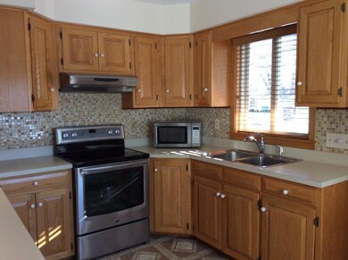KITCHEN WITH CUSTOM BUILD CUPBOARDS