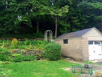 Garage. Back yard and block garage with new overhe
