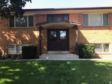 Close up of front porch of building that faces south