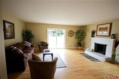 Open living area with slider going to backyard.