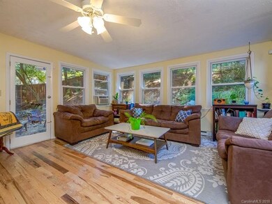 Lots of light in this comfy sunroom.