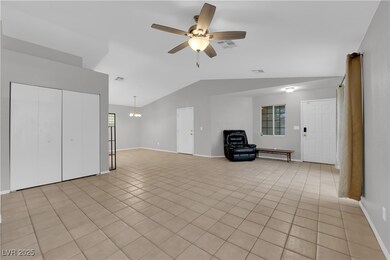 Unfurnished living room with vaulted ceiling, ceil