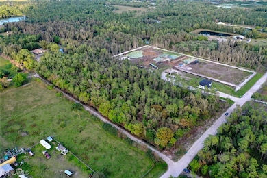 Aerial view of property and surrounding area featu
