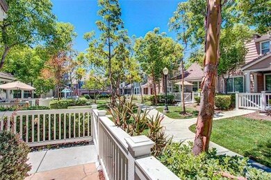 Large enclosed patio facing greenbelt
