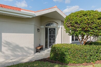 Property entrance with stucco siding