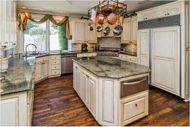 Reclaimed Oak warms the kitchen and family rooms..