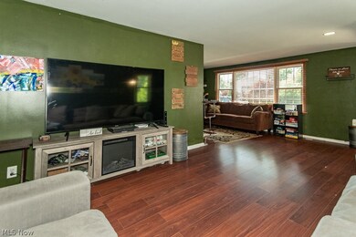 Living room featuring dark hardwood / wood-style floors