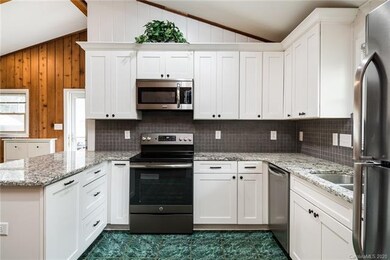 Renovated kitchen - granite countertops - stainles
