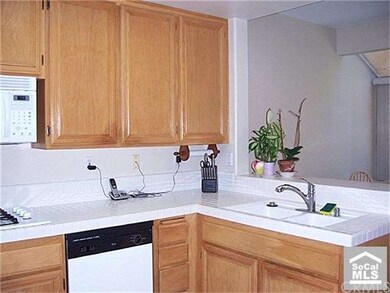 Kitchen opens to dining room.