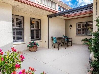 Best Of Maintenance-Free Living!  Private Villa Featuring Sunny Courtyard Which Includes Electric Entry Screen.  Interiors Complimented By Good Looking Plantation Shutters.
