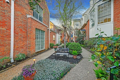 Large, common courtyard with lush landscaping in t
