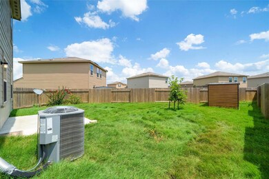 View of yard featuring a fenced backyard and cool