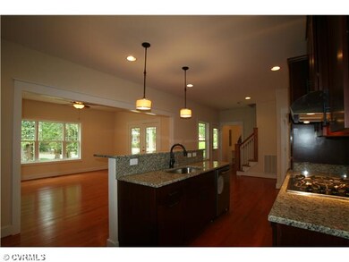 Kitchen - Kitchen opens to family room for open co