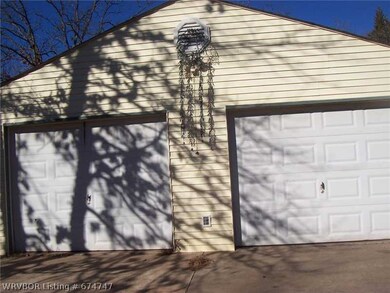 Parking Lot/Garage. 2 CAR DETACHED GARAGE