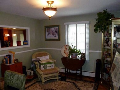 Dining Room. BRIGHT DINING ROOM WITH GLEAMING HARD