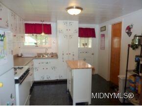 lots of charm and cabinets