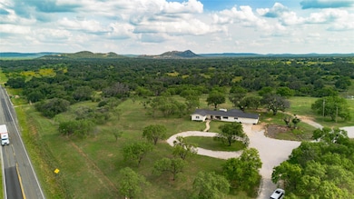 View from above of property featuring a heavily w
