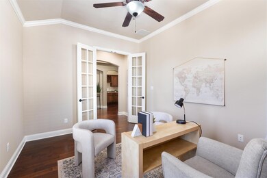 Home office featuring french doors, ornamental mo