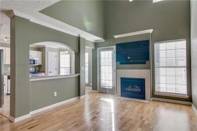 Cozy gas fireplace, vaulted ceilings and Samsung flat screen in the living room.