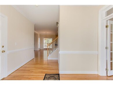 Welcoming Entrance Foyer, Refinished hardwood floo