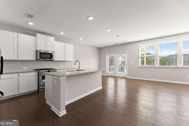 156 Round Pond Dr, Lilburn, GA 30047 - photo 6