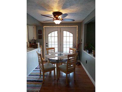 Kitchen. French doors leading to 2 level deck