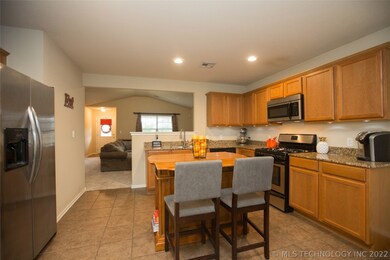 Stainless steel appliances & sink.