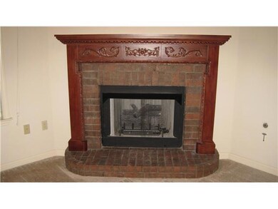 Wood carved mantel.