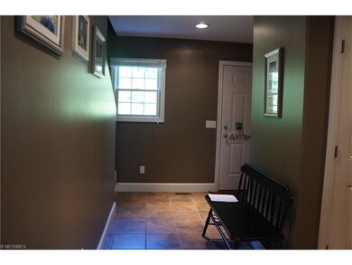 Enter in the front door. 1/s bath to left of door 