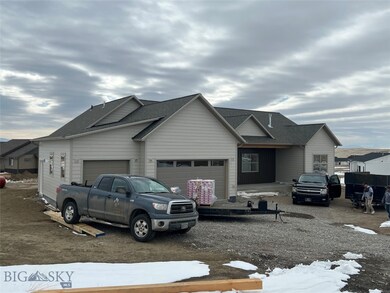 Home under construction update. Small garage door