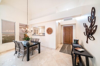 FRONT ENTRY-TRAVERTINE FLOORS